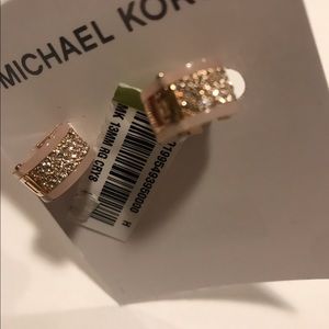 Michael Kors small hoop earrings.